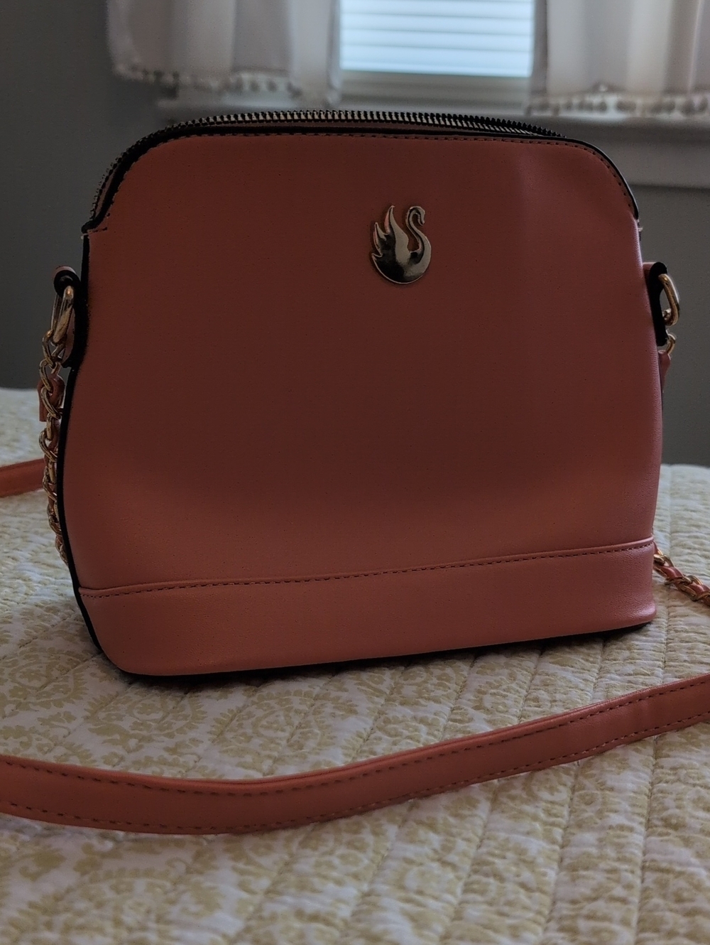 Swan Emblem Melon Crossbody Bag